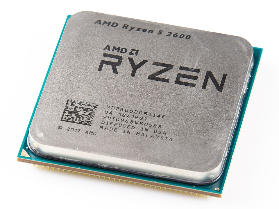 AMD Ryzen 5 2600 processor chip on its AM4 socket base