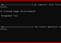 Command Prompt showing DISM RestoreHealth finishing at 100 percent successfully