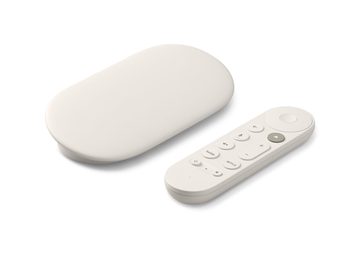 Google TV Streamer streaming device and Voice Remote on white background
