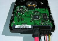 Hard disk drive with a pink Serial ATA data cable attached