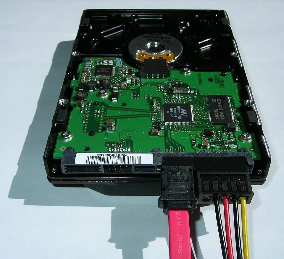 Hard disk drive with a pink Serial ATA data cable attached