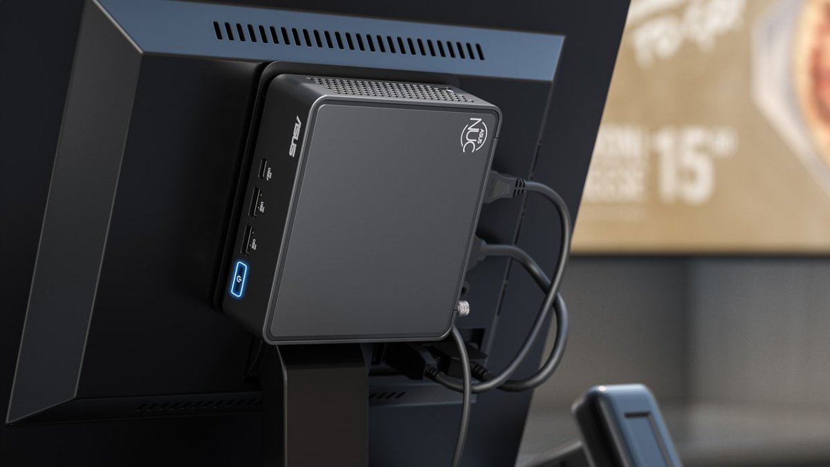 NUC box mounted to the back of a monitor with a bracket