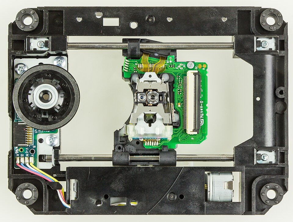 Optical drive laser pickup head, lens, and sled motor exposed