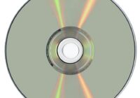 Reflective underside of a DVD disc showing its rainbow data layer