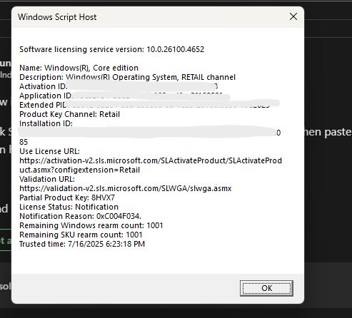Script Host dialog showing detailed Windows licensing information