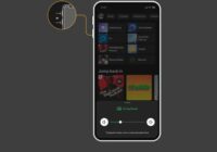 Spotify app home screen with a connected speaker's volume slider