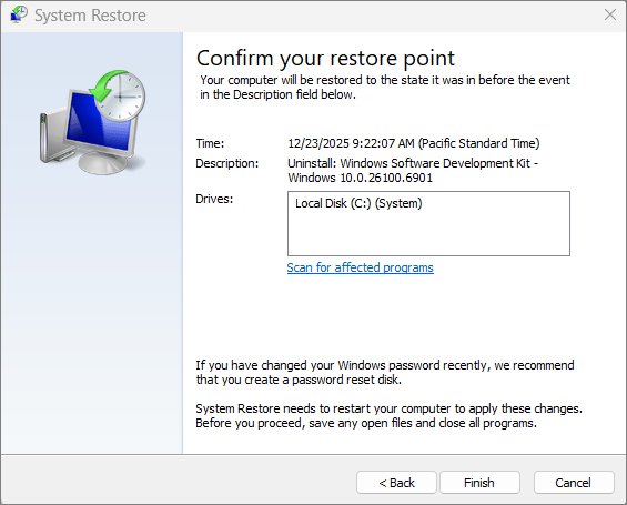 System Restore dialog confirming a restore point and affected drive