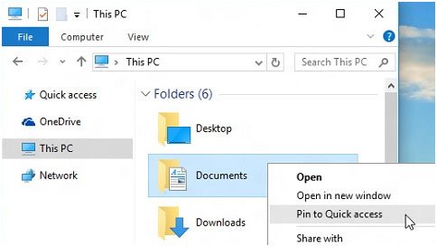 Windows 10 File Explorer with This PC selected in the navigation pane