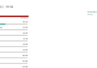 Windows 10 storage overview with a nearly full red bar and Temporary files listed