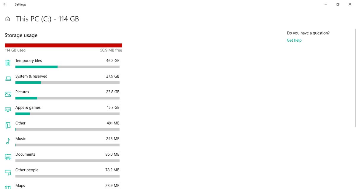 Windows 10 storage overview with a nearly full red bar and Temporary files listed