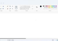 Windows 11 Paint app open with ribbon toolbar and blank canvas