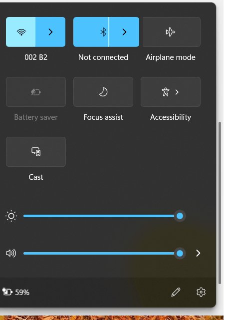 Windows 11 Quick Settings panel with the Bluetooth tile highlighted