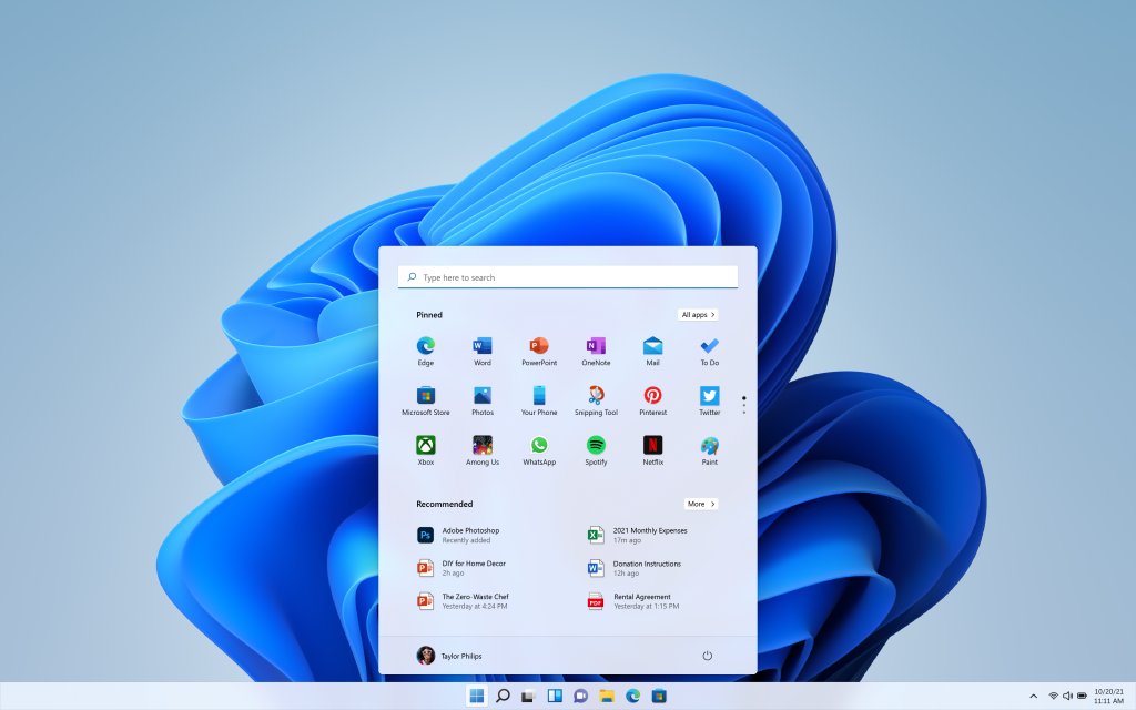 Windows 11 Start menu with pinned apps in a centered panel