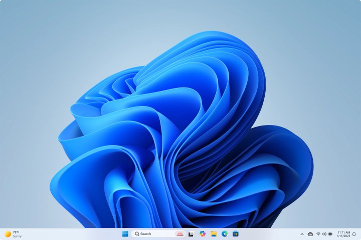 Windows 11 desktop and taskbar shown in light color mode