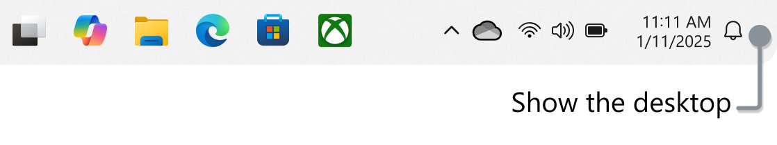 Windows 11 taskbar with the Show the desktop button labeled