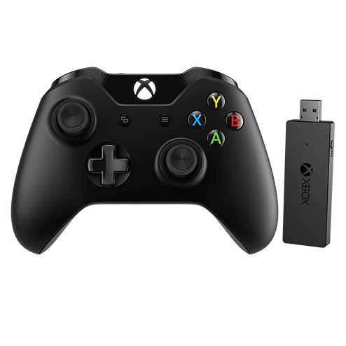 Xbox controller next to its USB Wireless Adapter for Windows
