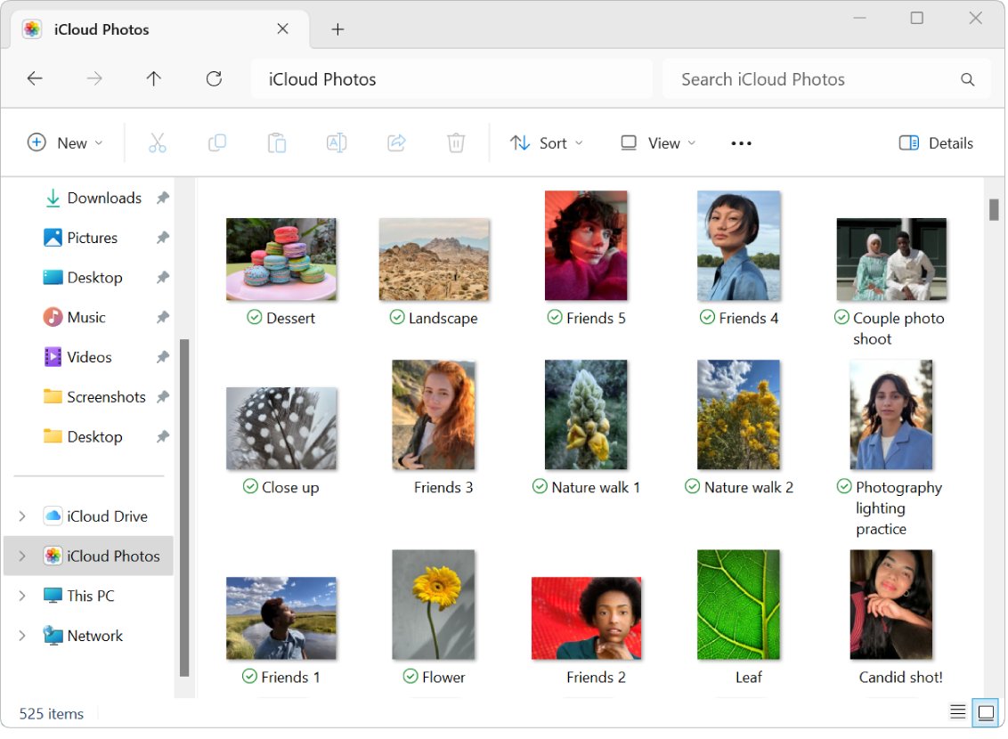 iCloud Photos folder open in File Explorer with downloaded thumbnails