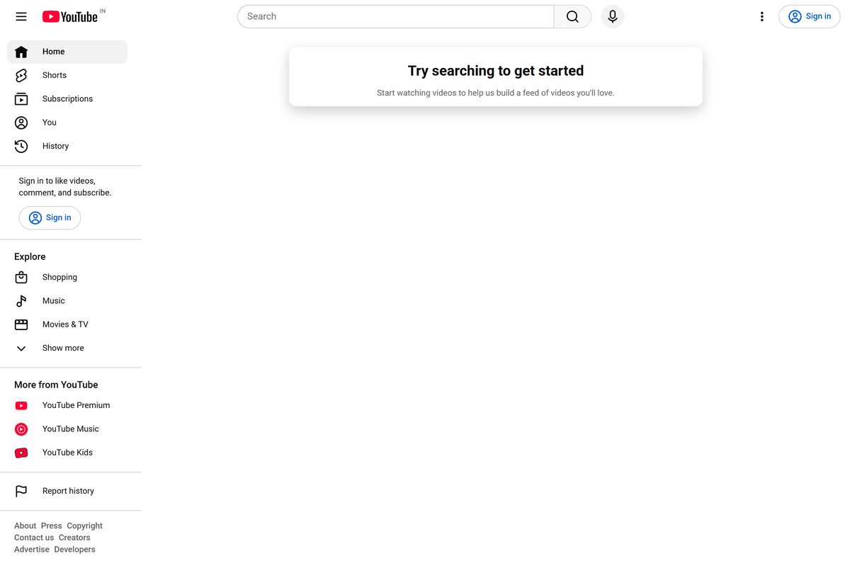 YouTube home page open in a desktop browser with the sign-in button
