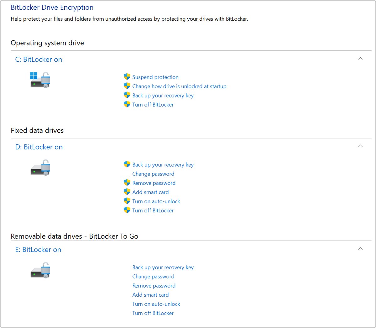 BitLocker Drive Encryption window listing operating system, fixed and removable drives