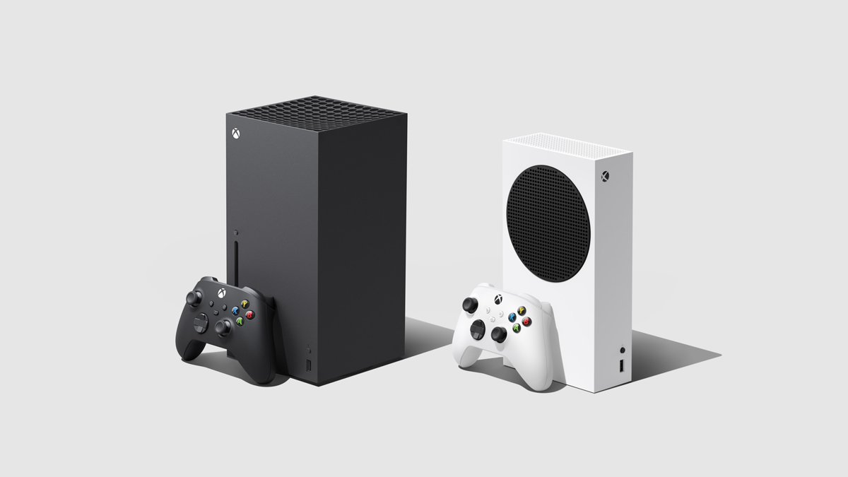 Black Xbox Series X beside the smaller white Xbox Series S with controllers