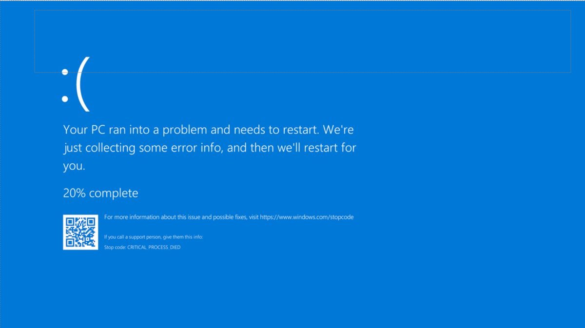 Blue screen with sad face, QR code and percentage complete
