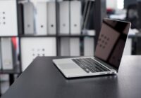Apple Devices app on Mac - MacBook Pro on a desk