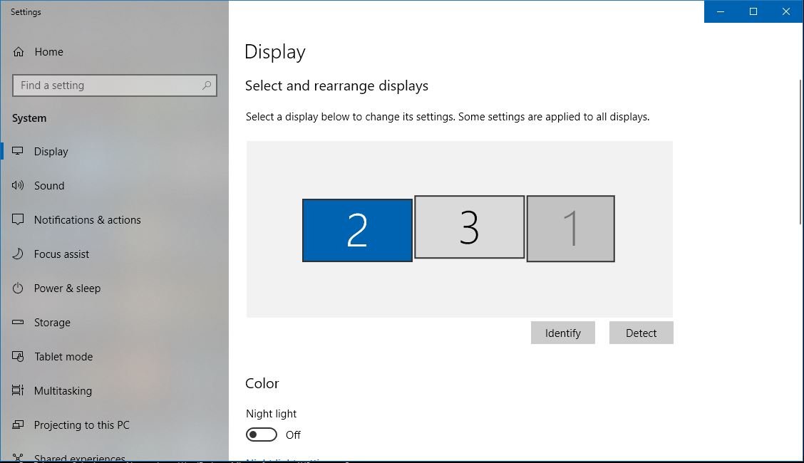 Check the TV connection in Windows display settings with numbered screens and Identify