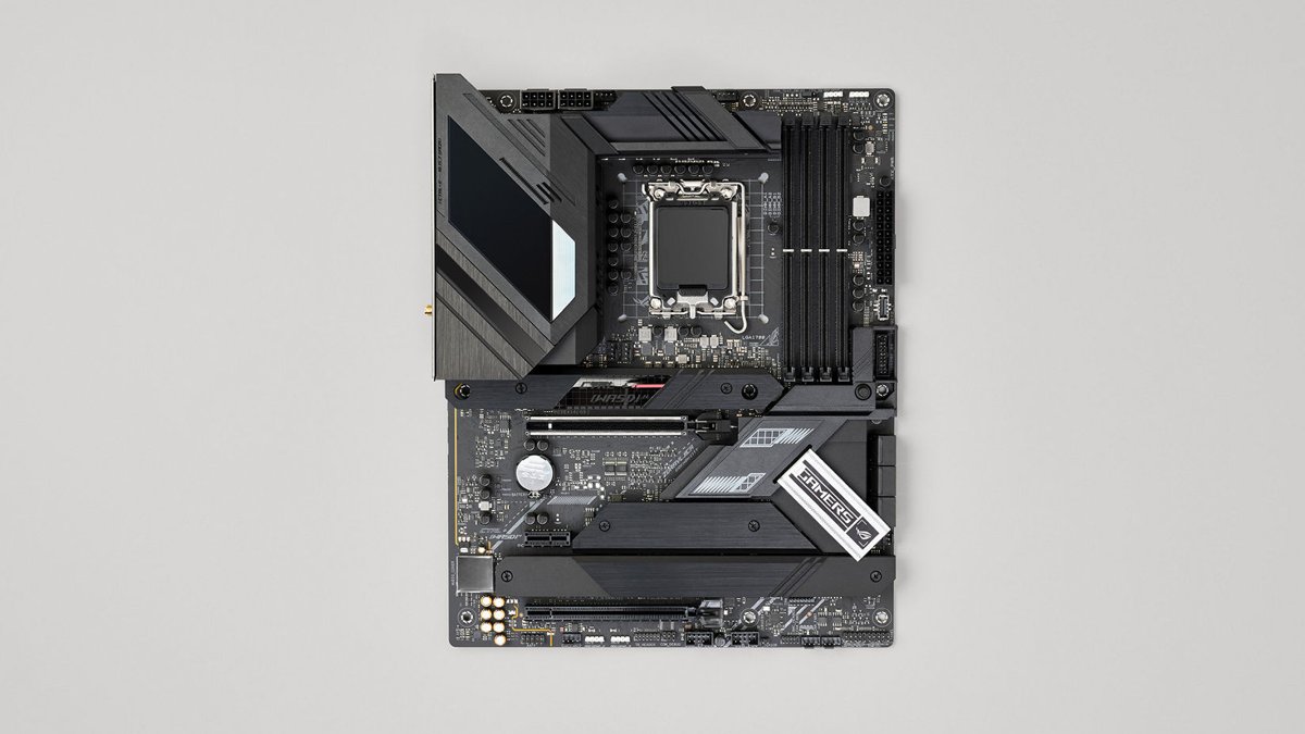 Computer motherboard with CPU socket, RAM slots and expansion slots