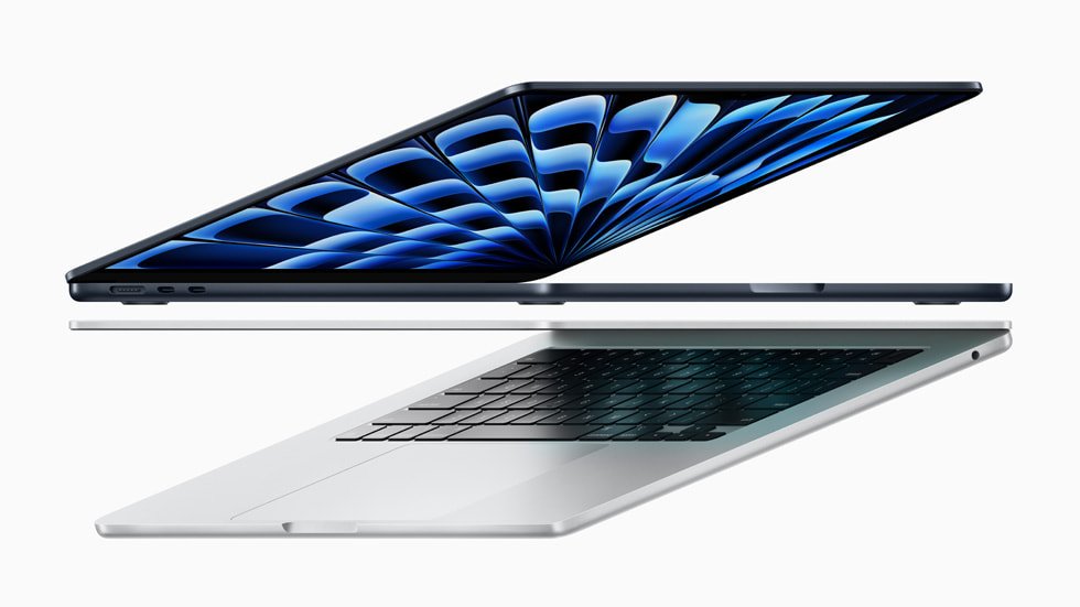 MacBook Air M3 in Midnight stacked above a Starlight model