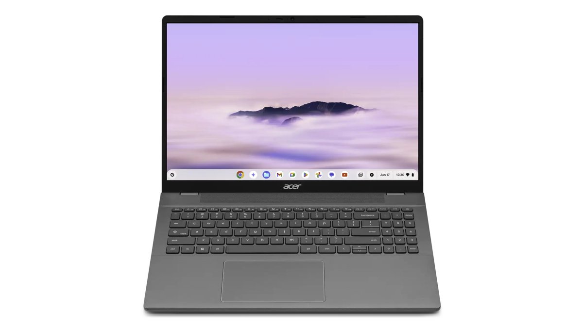 Open Chromebook laptop showing its keyboard, touchpad and ChromeOS desktop