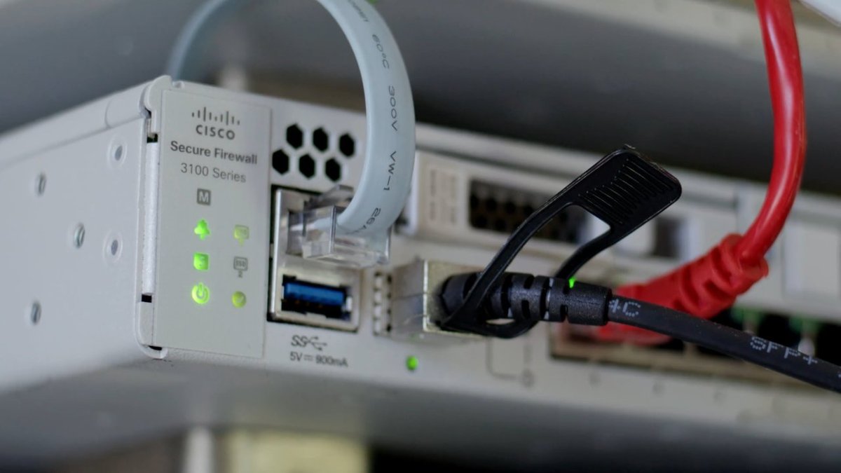Router vs switch vs firewall: Cisco Secure Firewall 3100 Series with cables plugged in