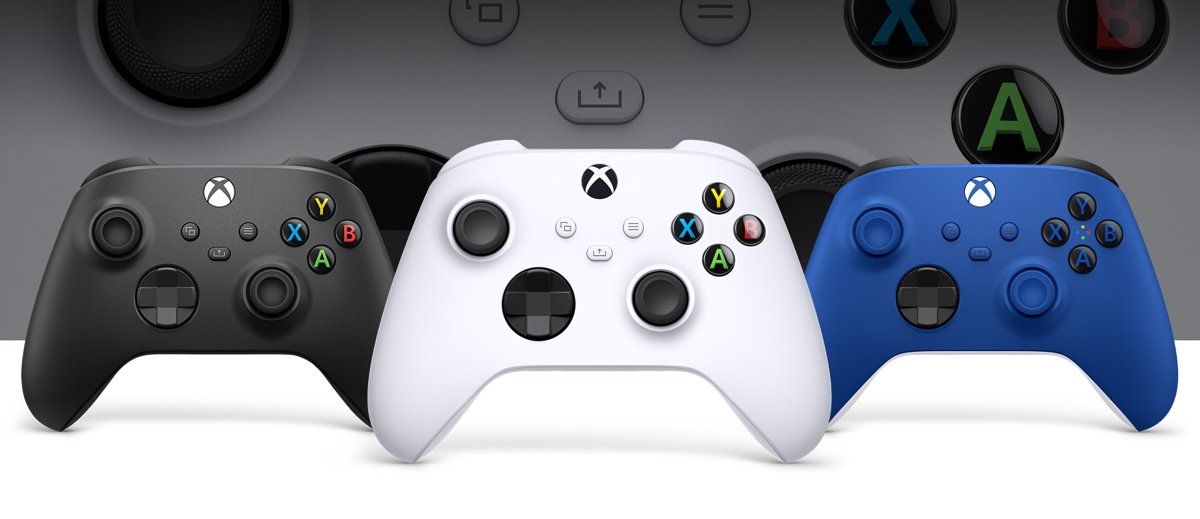 Three Xbox Wireless Controllers in black, white and blue side by side