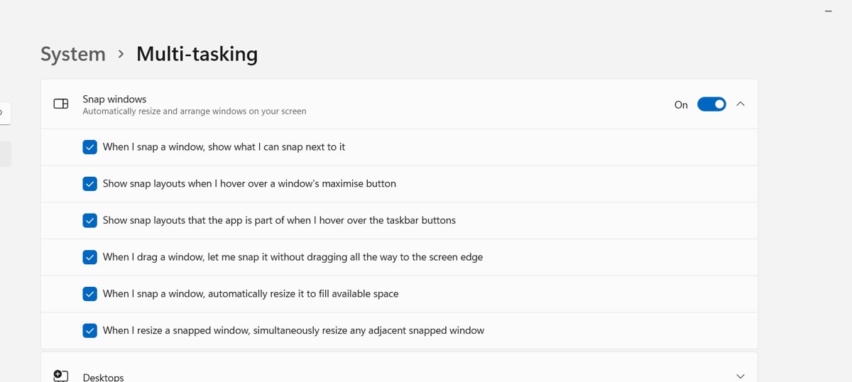 Turn on Snap windows in Windows 11 Settings under System > Multitasking