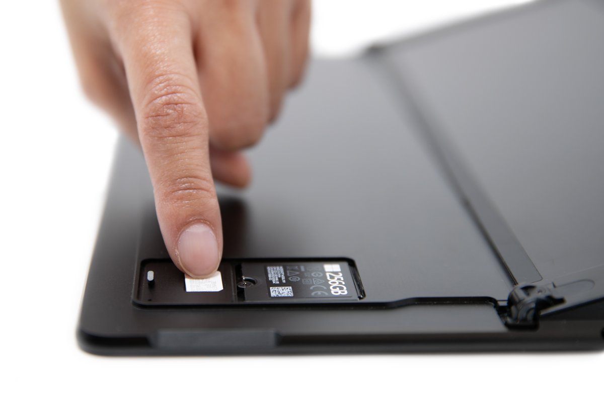 Use a SIM card in a laptop by placing it in the tray