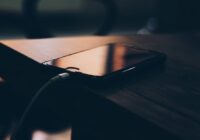 When to charge your iPhone or iPad - phone connected to a charger