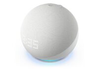 White Echo Dot smart speaker with its blue light ring glowing