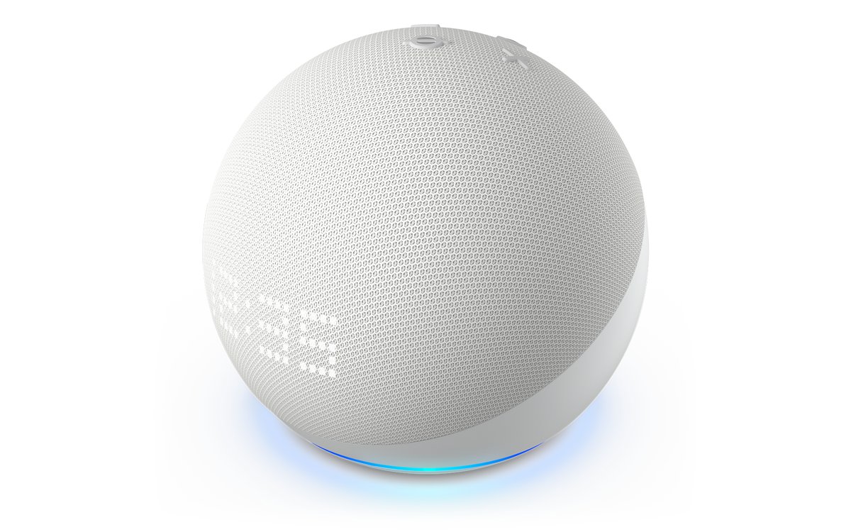 White Echo Dot smart speaker with its blue light ring glowing