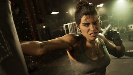 Woman in a gym throwing a punch toward the camera