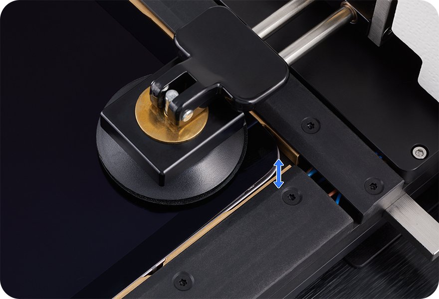 iPad display held by a suction cup in Apple's heated display removal fixture