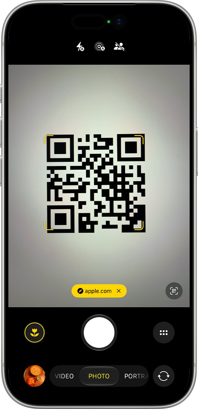 iPhone Camera app framing a QR code with a yellow link banner below it